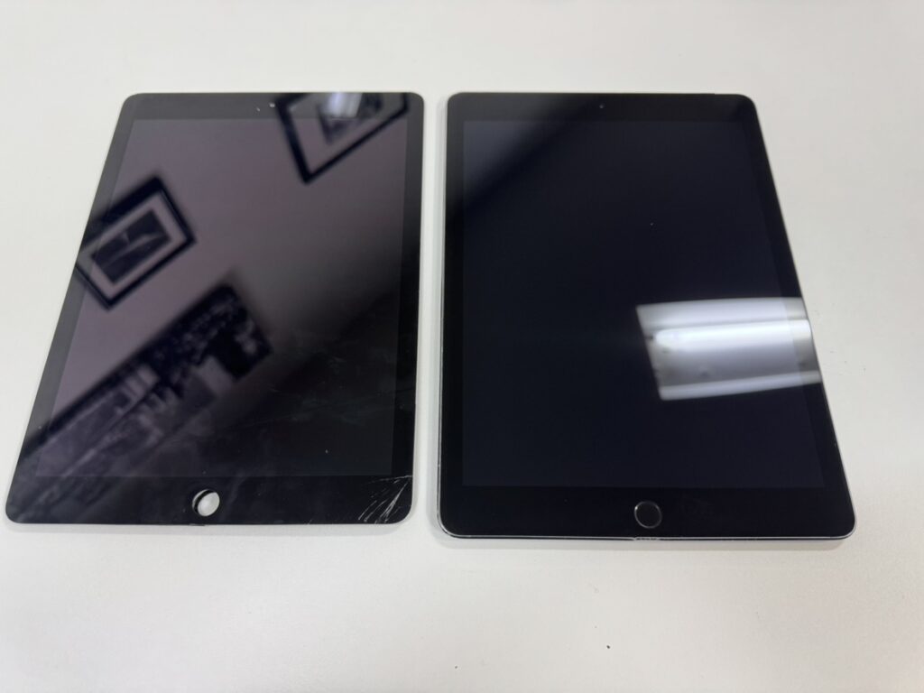 画面交換修理が完了し、割れやタッチ不良が解消された iPad Air 2。新品の画面に交換され、正常に動作している修理後の状態を撮影した写真。