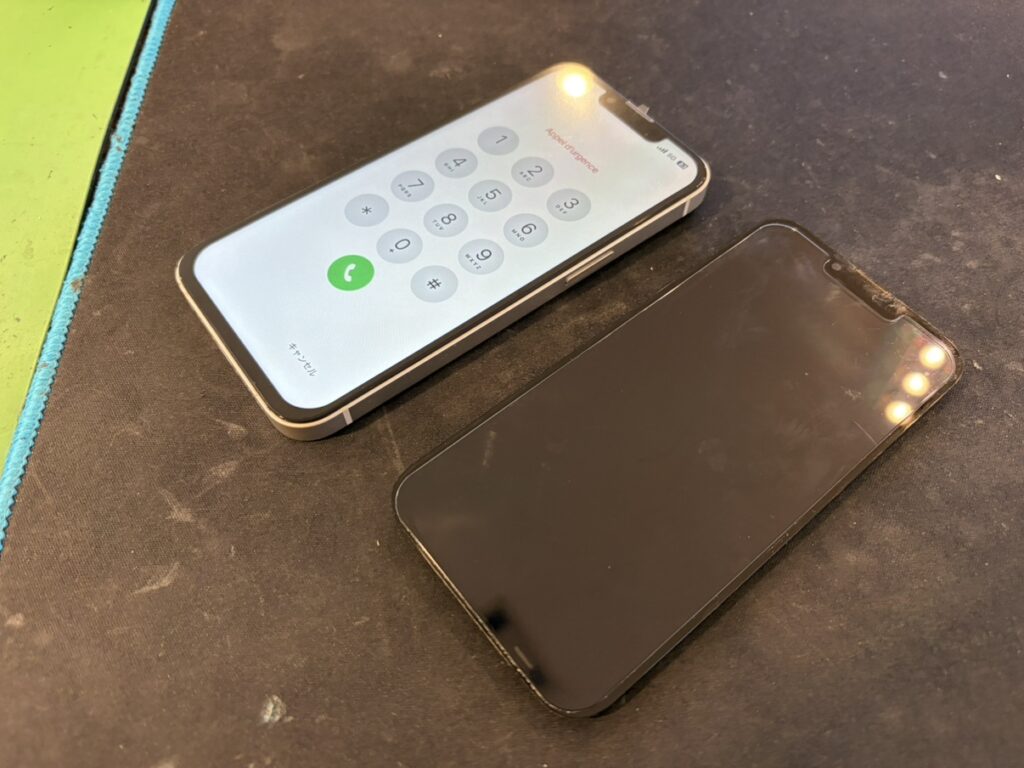 画面修理を終えてデータもそのままで綺麗に映るようになったiPhone13の本体